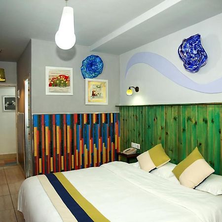 Haikou Time Inn Theme Hotel Exterior photo