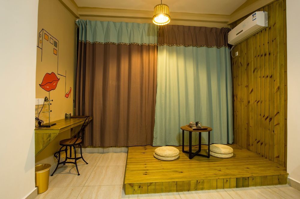 Haikou Time Inn Theme Hotel Exterior photo